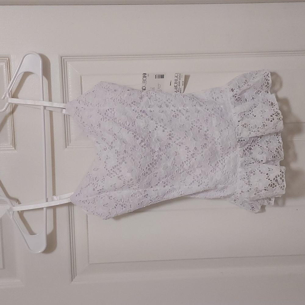 White full lace tank top with ruffle hem
